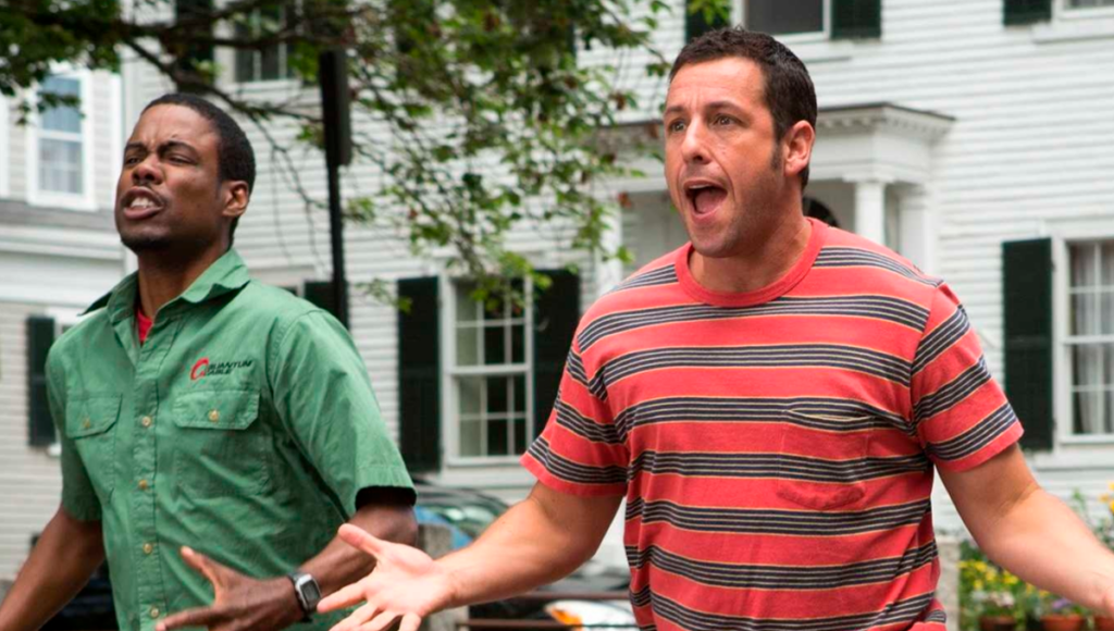 Adam Sandler e Chris Rock correndo indignados e de braços abertos