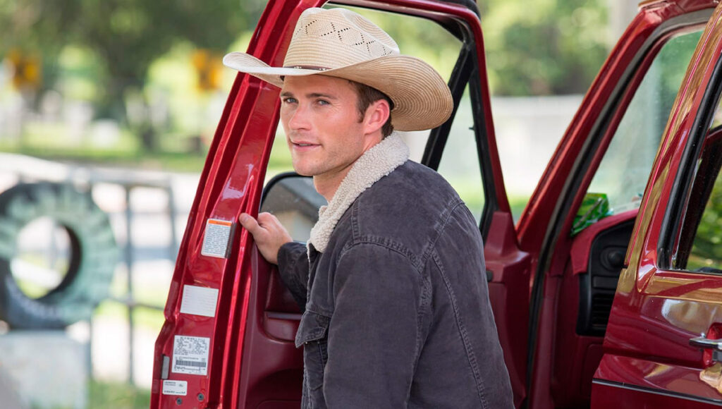 Scott Eastwood com chapéu de cowboy em Uma Longa Jornada